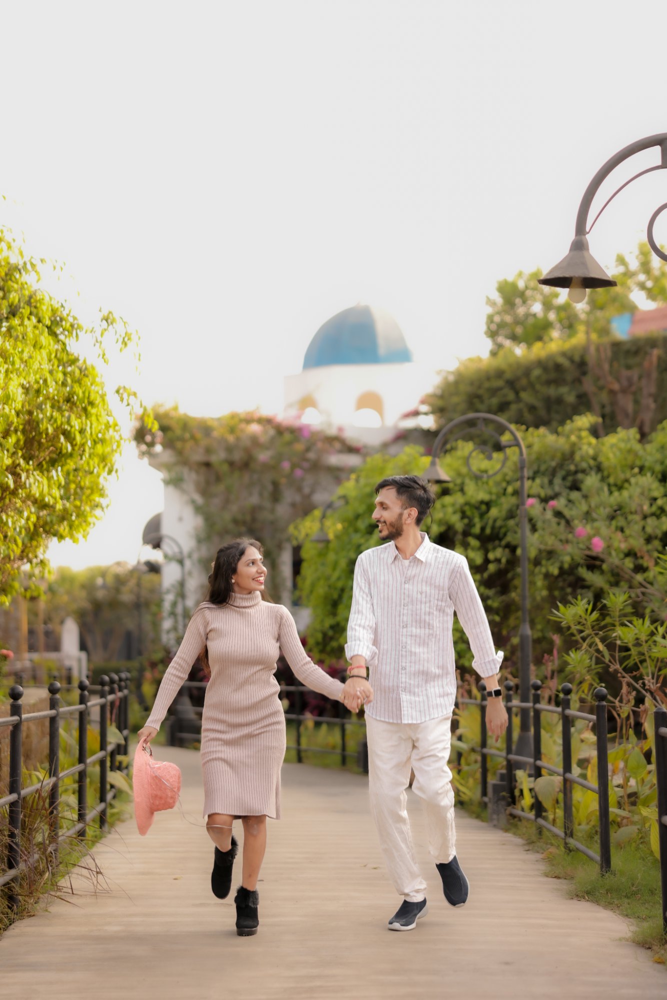 Pre-Wedding Couple Walking in Garden